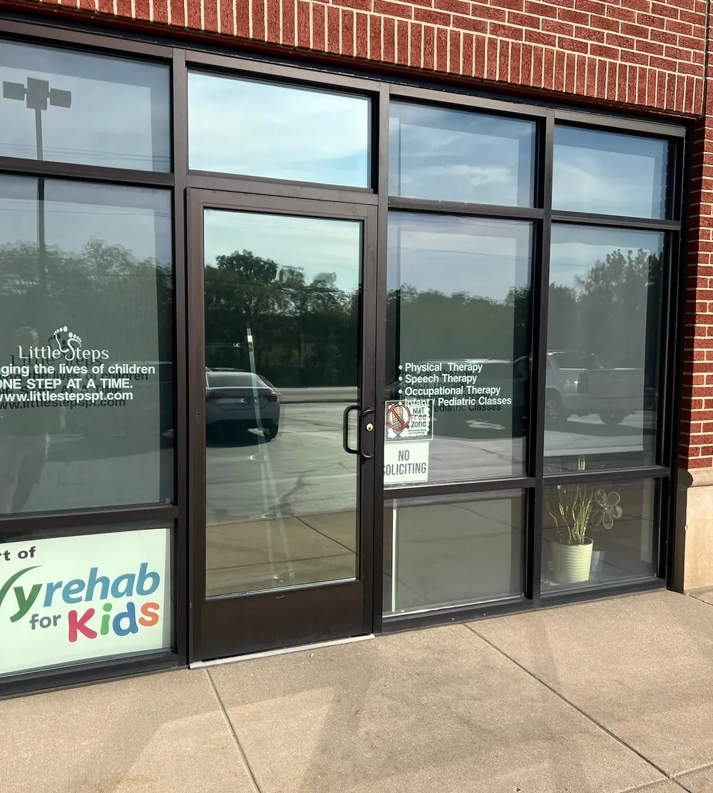 Commercial window film on storefront windows and glass entry door in St. John, IN