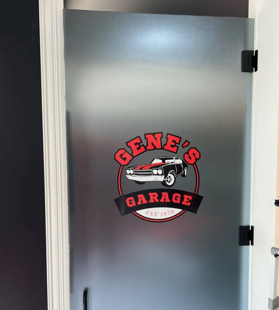 Frosted glass door with a custom logo graphic, vinyl graphics and logo film in St. John, IN