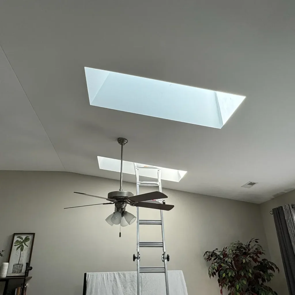 Interior view of living room skylights with window film in St. John, IN